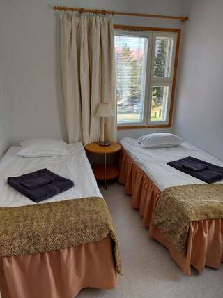 Отель Korpi Bistro & Guesthouse Энонкоски Двухместный номер с 2 отдельными кроватями-4