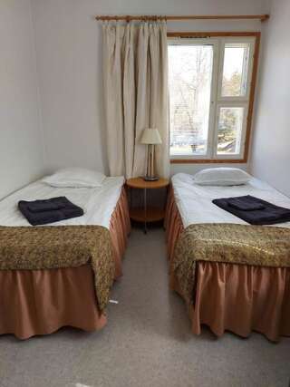 Отель Korpi Bistro & Guesthouse Энонкоски Стандартный двухместный номер с 2 отдельными кроватями и общей ванной комнатой-7
